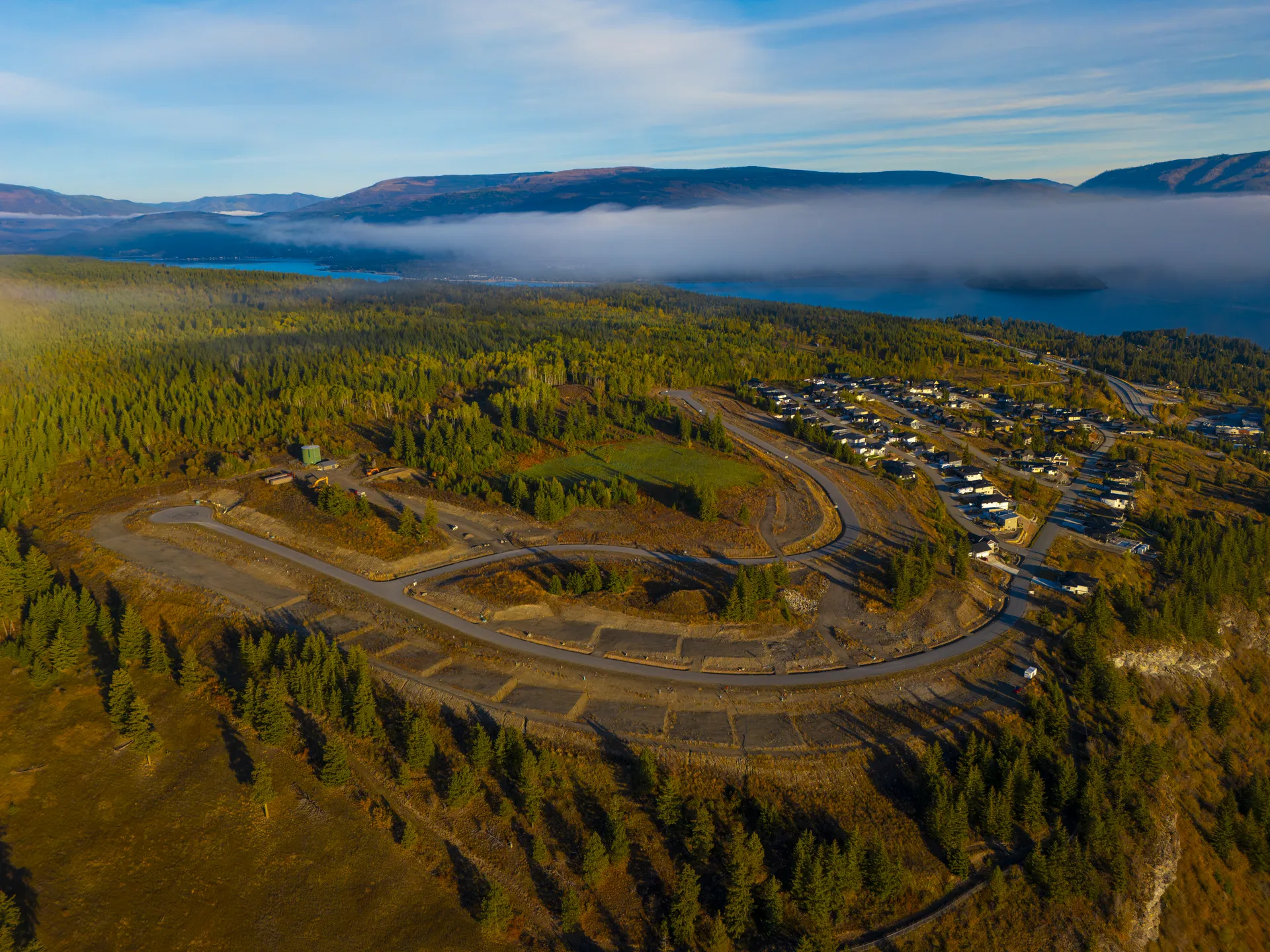 Lake view lots Blind Bay: The Highlands Phase 3 hillside, the established homes beside it and Shuswap Lake beyond